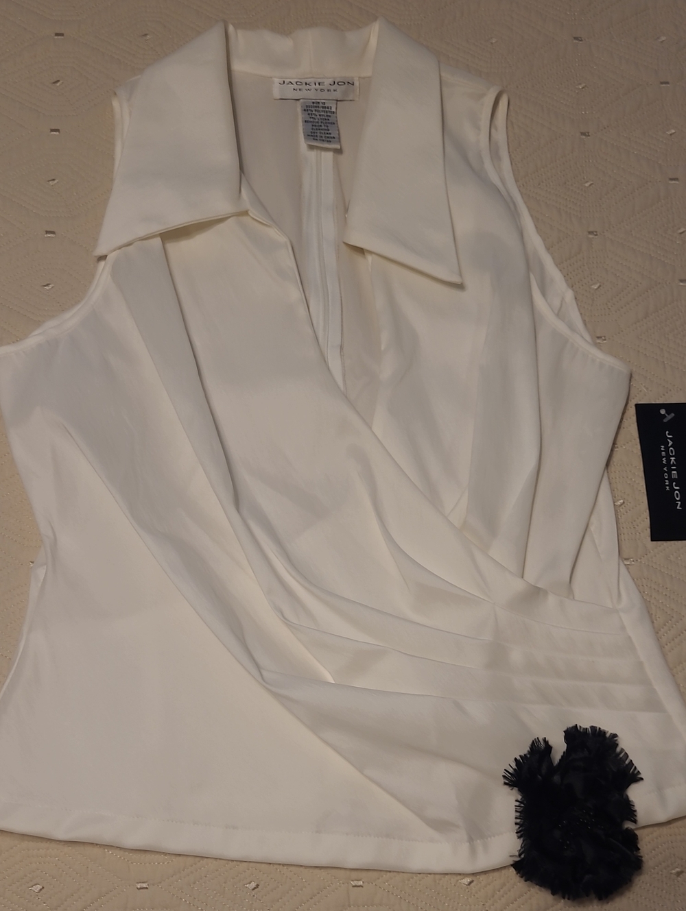 Jackie Jon Women's Cream Sleeveless Wrap Satin Top with Floral Accent Size 12